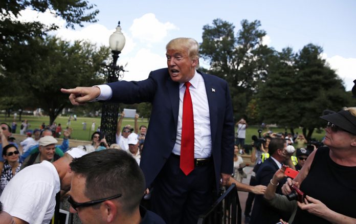 Republican presidential candidate Trump arrives at anti-Iran nuclear deal rally on Capitol Hill in Washington